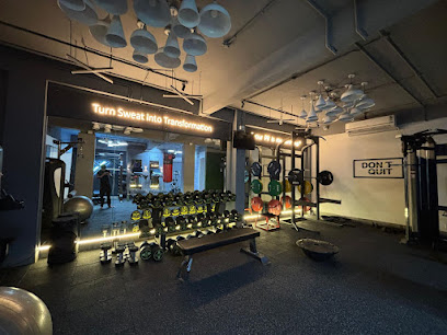 Dumbbells, mirrors and training area at Active-X Fitness Studio